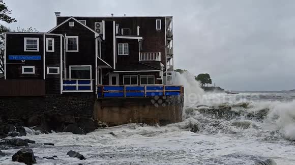 N'oreaster waves crash into Marblehead restaurant as storm continues to batter Massachusetts