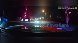 US: Police Pull Impaired Driver From Tracks Seconds Before Train Destroys Car