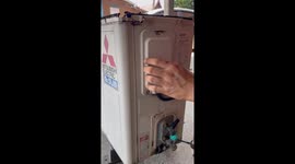 Repairman finds bees nest inside broken airc on unit