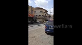 Israeli soldiers break into a jewelry store in the center of Qalqilia, north of the West Bank