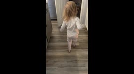 Cute little girl pretends she knows how to whistle but is making silly noises