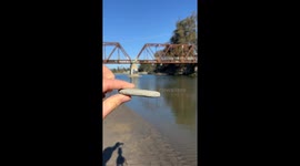 Rock Skips Satisfyingly Across River