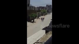 The moment a child was saved few seconds before the Israeli bombed a home in Gaza City