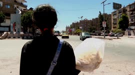 Syria: Young Syrian girl struggles to earn meager living amid war, hardship