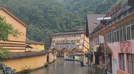 Riverside house collapses after heavy rain triggers flooding in southwestern China