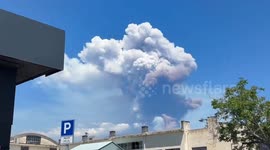 Plume of smoke emitted as Mount Etna erupts