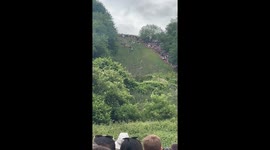 Daredevils tumble down Cooper’s Hill in Gloucester’s wild cheese chase