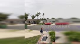 US, Los Angeles: Huntington Beach Lightning Strikes Tree Behind Kids CAUGHT ON CAMERA