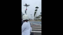 Hyper-localised rain covers half the street and the rest stays dry