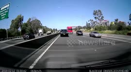 White SUV Flips Over onto Vehicle on Freeway
