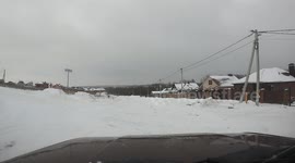 Skitching Snowboarder Veers into Wrong Lane