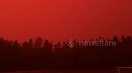 Canada: Red Sky Over Manitoba Sparks Alarm As Wildfires Rage Near The Pas