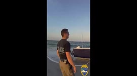 Stranded Boat Rescued by Police on Popular Florida Beach