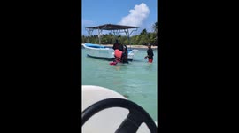 Men Fighting on Dominican Republic Beach
