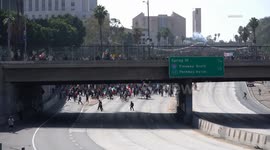 US, Los Angeles: Downtown Los Angeles Anti ICE Protesters Take Over Freeway