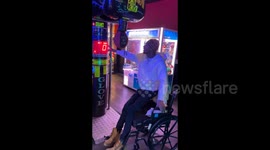 US: Me trying to hit the punching bag while in the wheel chair