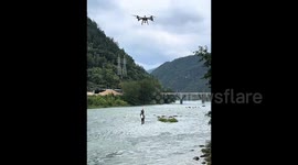 Drone used to airlift fisherman to safety after getting stranded in raging river