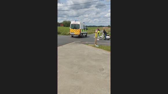 Ambulance takes a jump way too fast.: Let's hope no one is in the back of the ambulance here.