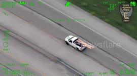 US: Man Throws Wood At Police Then Flies Out Of Truck In Wrong Way Crash