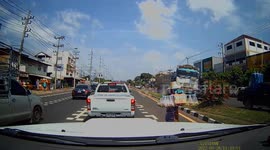 Out-of-control truck almost hits pedestrian