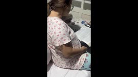 Puppy entranced by nighttime Bible reading