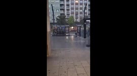 Heavy rain and strong winds under massive cumulonimbus arcus cloud in Logroño, Spain