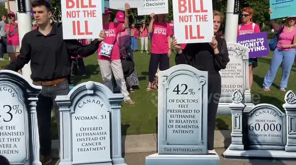 Pro and anti Assisted Dying Bill protesters gather in Parliament Square