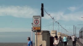 red arrows perform the corkscrew flying past blackpool tower