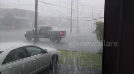 Driver fails to leave car park by getting stuck on the curb