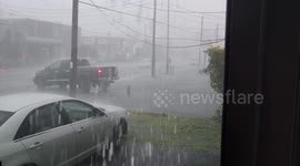 Driver fails to leave car park by getting stuck on the curb