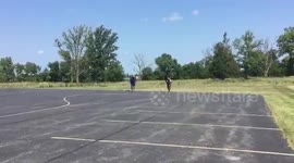 Daredevils flip over three cars