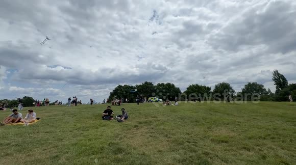Kite Solidarity in London  Palestine supporters fly colourful kites at Parliament Hill in London, uniting in a solidarity gathering. The peaceful event sees individuals and families launching kites marked with Palestinian symbols to express hope, unity, a