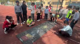 Playful long jump trick pulls off a laugh in Hubei, China