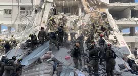 Israeli troops search rubble of buildings hit by Iranian missile attacks