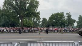 Tank Crew Member Makes Heart Gesture During U.S. Army Parade in Washington