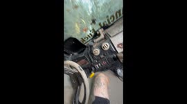 Off-road vehicle stuck and tilted in deep mud in Pembroke, Georgia, USA