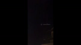 Multiple lights fall from the sky over Beirut, Lebanon