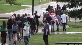 No Kings Norman protesters march around Norman, Oklahoma before setting up in front of City Hall