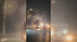 West Bank Palestinians Parade Iran Missile Fragment