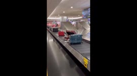 Haagen Dazs ice cream seen on luggage carousel at airport