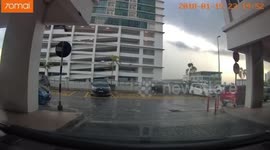 Car wash worker crashes customer's car off the third floor of apartment building