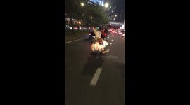 Evening Scooter Transport with Poultry in Southern Vietnam