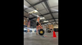 Weightlifter nearly loses balance during overhead lift in Nîmes, France