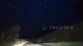 Silent heat lightning storm spotted on a drive through the countryside North East England in pitch darkness.