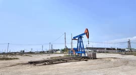 Oil pump extracting crude in Azerbaijan – Energy Production & Global Crisis