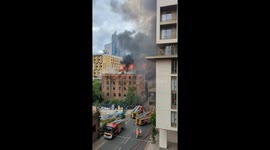 Huge fire in Manchester breaks out and hundreds are evacuated. Firemen can't contain it.