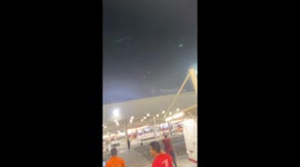 Dozens of Qatari locals film sky as Iranian missiles fly over head