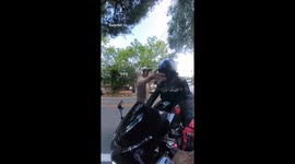 Shocking moment man hits biker’s helmet mid-ride in Orange County
