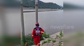 China: Rescue Team Saves Injured Deer Trapped By River In Inner Mongolia