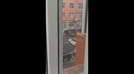 Solar heater crashes onto road during sudden storm in Taiyuan, Shanxi, China